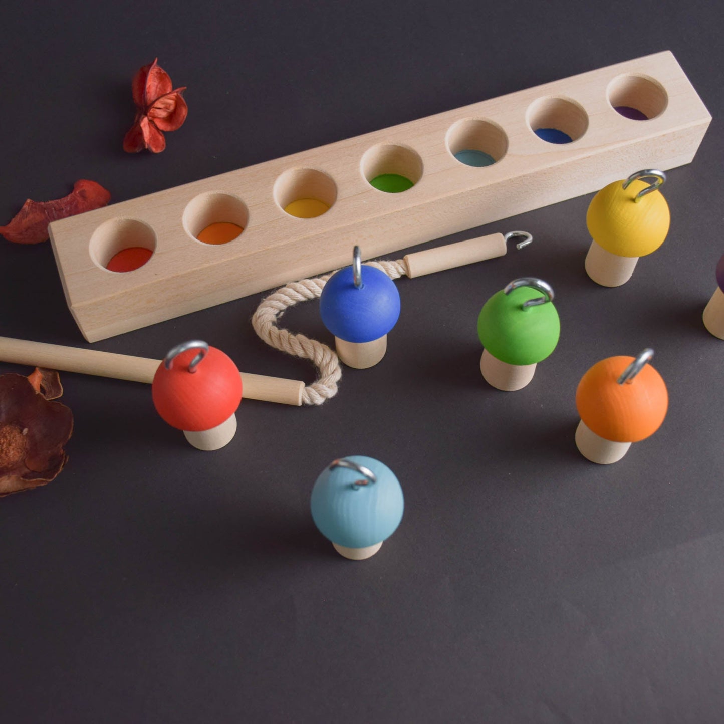 Juego de equilibrio para niños: Hongos en una caña de pescar, arcoíris