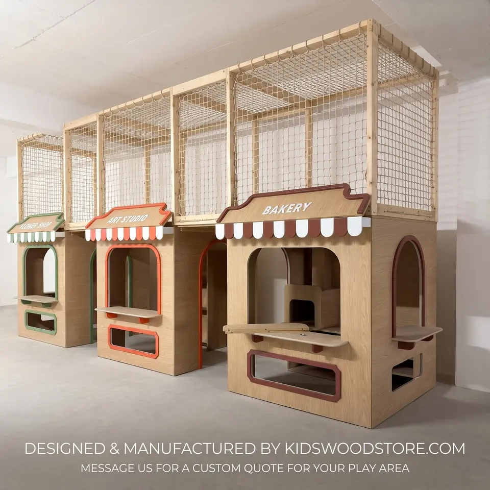 Side angle of wooden role play shops featuring netted upper crawlway