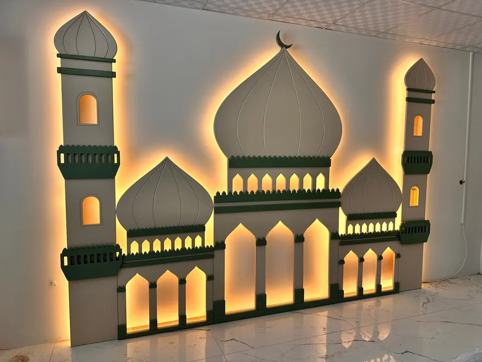 Illuminated wooden mosque backdrop with backlit minarets installed on room wall