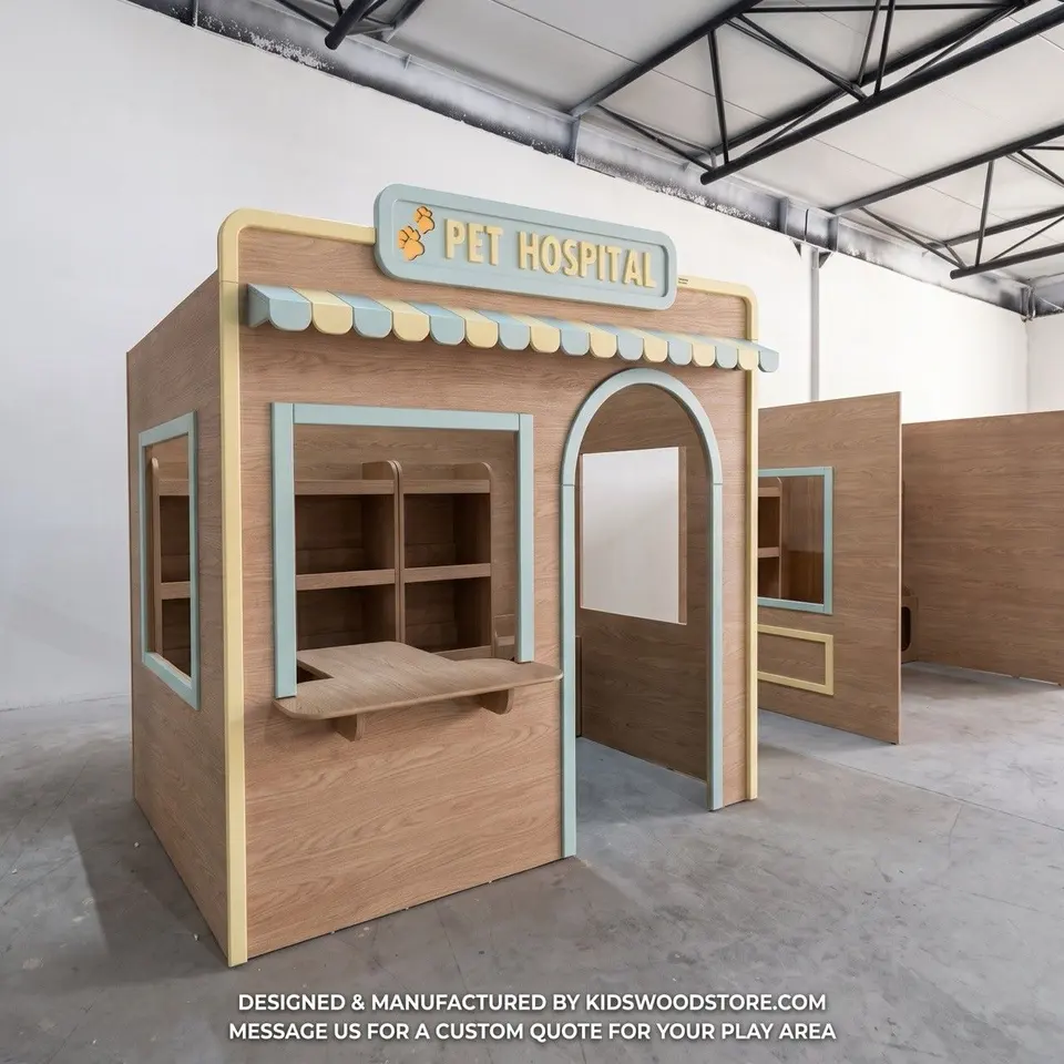 Angled view of wooden pet hospital dramatic playhouse in workshop