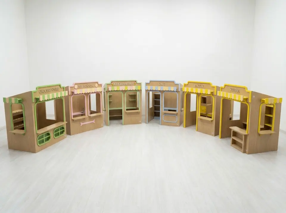 Semicircle arrangement of wooden play kiosks in an empty play area