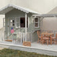 Luxury Outdoor Wooden Playhouse with Front Porch & Side Veranda
